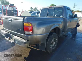 1998 Ford Ranger XL z VIN 1FTYR10C1WPA09251, wystawiony jako IAAI lot #42061336 z przebiegiem 274 498 mil mil oraz . Historia ofert i sprzedaży dostępna na DreamBid. Obrazek 4.