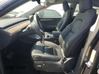 2024 Tesla Model Y с VIN 7SAYGDEDXRF095167, выставлен на аукционе Copart как лот 61676245 с пробегом 12 988 миль миль и Списание • Salvage title. История ставок и продаж доступна на DreamBid. Изображение 7.
