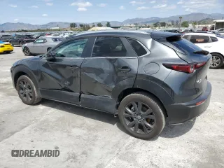 2024 Mazda CX-30 2.5 S Select Sport with VIN 3MVDMBBM3RM661595, listed as a Copart auction lot 50917335 with 7,252 mi miles and Salvage Title. Bid and sale history available at carsss.com. Image 2.