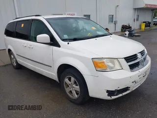 2010 Dodge Grand Caravan SXT z VIN 2D4RN5D11AR280983, wystawiony jako IAAI lot #42363411 z przebiegiem Nie podano mil oraz . Historia ofert i sprzedaży dostępna na DreamBid. Obrazek 1.