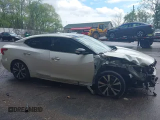 2017 Nissan Maxima SV z VIN 1N4AA6AP3HC434557, wystawiony jako IAAI lot #42203547 z przebiegiem 121 518 mil mil oraz . Historia ofert i sprzedaży dostępna na DreamBid. Obrazek 13.