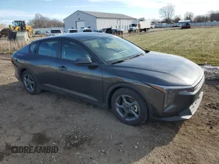 2025 Kia K4 LXS with VIN 3KPFT4DE6SE032041, listed as a Copart auction lot 49870905 with 1,996 mi miles and Salvage Title. Bid and sale history available at carsss.com. Image 4.