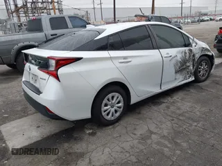 2021 Toyota Prius L Eco with VIN JTDKAMFU6M3150707, listed as a IAAI auction lot 41867272 with 55,499 mi miles and . Bid and sale history available at DreamBid. Image 4.