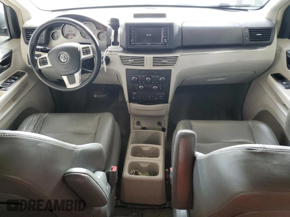 2011 Volkswagen Routan SE with VIN 2V4RW3DG7BR717718, listed as a Copart auction lot 63480915 with 271,938 mi miles and Salvage title. Bid and sale history available at DreamBid. Image 8.