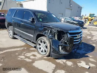 2017 Cadillac Escalade Premium Luxury with VIN 1GYS4CKJXHR133970, listed as a IAAI auction lot 41666038 with 100,269 mi miles. Bid and sale history available at carsss.com. Image 1.