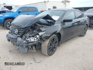2018 Nissan Altima 2.5 SR with VIN 1N4AL3AP3JC298848, listed as a IAAI auction lot 40966335 with 121,163 mi miles. Bid and sale history available at carsss.com. Image 2.