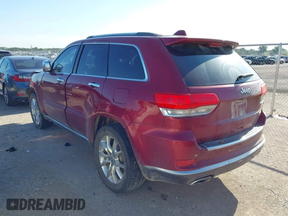 2015 Jeep Grand Cherokee Summit with VIN 1C4RJEJG9FC100568, listed as a IAAI auction lot 42512705 with 128,413 mi miles and . Bid and sale history available at DreamBid. Image 3.