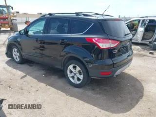 2016 Ford Escape SE z VIN 1FMCU9G97GUA77456, wystawiony jako IAAI lot #42088983 z przebiegiem 160 718 mil mil oraz . Historia ofert i sprzedaży dostępna na DreamBid. Obrazek 3.