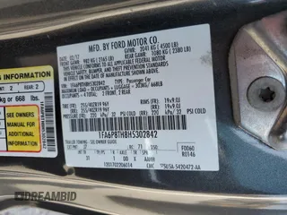 2017 Ford Mustang EcoBoost with VIN 1FA6P8TH8H5302842, listed as a Copart auction lot 62352795 with 107,165 mi miles and Salvage title. Bid and sale history available at DreamBid. Image 13.