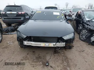 2016 Audi A7 3.0 Premium Plus with VIN WAUWGAFC0GN006470, listed as a IAAI auction lot 41638615 with 104,040 mi miles. Bid and sale history available at carsss.com. Image 6.