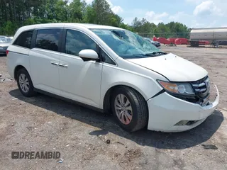 2016 Honda Odyssey EX-L z VIN 5FNRL5H68GB010923, wystawiony jako IAAI lot #42135674 z przebiegiem 228 885 mil mil oraz . Historia ofert i sprzedaży dostępna na DreamBid. Obrazek 1.