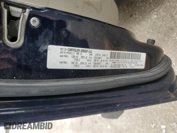 2013 Chrysler Town & Country Limited z VIN 2C4RC1GG9DR711585, wystawiony jako Copart lot #52674455 z przebiegiem Nie podano mil oraz Szkoda całkowita • Salvage title. Historia ofert i sprzedaży dostępna na DreamBid. Obrazek 13.