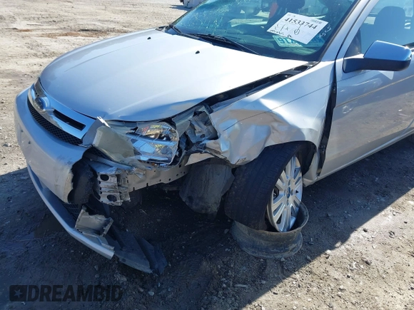2008 Ford Focus SE with VIN 1FAHP33N48W114038, listed as a IAAI auction lot 41533744 with 143,065 mi miles. Bid and sale history available at carsss.com. Image 6.