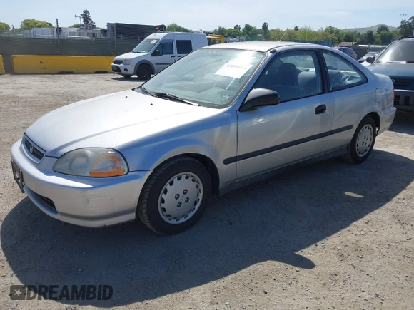 1997 Honda Civic DX with VIN 1HGEJ6220VL106203, listed as a IAAI auction lot 42098813 with 192,343 mi miles. Bid and sale history available at carsss.com. Image 2.