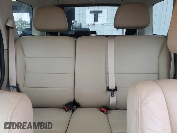 2010 Ford Escape Limited with VIN 1FMCU0EGXAKA03092, listed as a Copart auction lot 61094785 with 114,884 mi miles and Salvage title. Bid and sale history available at DreamBid. Image 10.