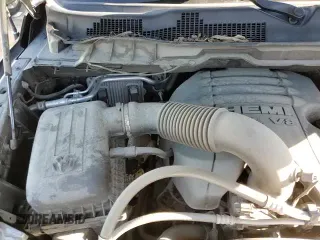 2019 Ram 1500 Express z VIN 3C6JR6AT4KG511528, wystawiony jako Copart lot #64066725 z przebiegiem 110 421 mil mil oraz Szkoda całkowita • Salvage title. Historia ofert i sprzedaży dostępna na DreamBid. Obrazek 13.