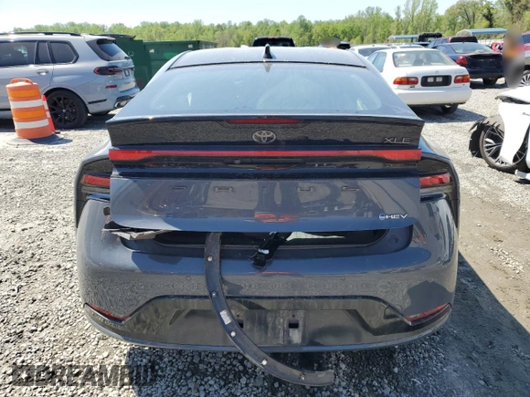 2023 Toyota Prius LE z VIN JTDADABU7P3002464, wystawiony jako Copart lot #52369955 z przebiegiem 39 772 mil mil oraz Szkoda całkowita • Salvage title. Historia ofert i sprzedaży dostępna na DreamBid. Obrazek 6.