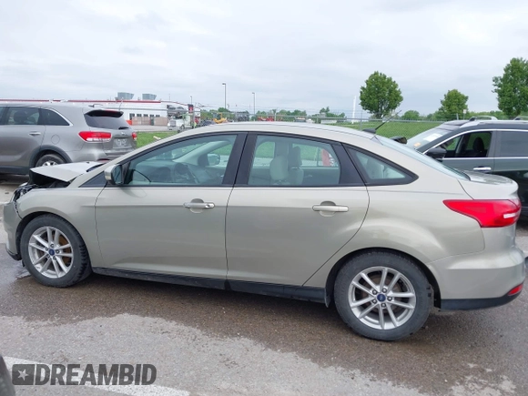 2016 Ford Focus SE z VIN 1FADP3F26GL332224, wystawiony jako IAAI lot #42167222 z przebiegiem 134 423 mil mil oraz . Historia ofert i sprzedaży dostępna na DreamBid. Obrazek 14.