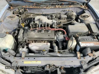 1996 Geo Prizm LSi z VIN 1Y1SK5262TZ041811, wystawiony jako Copart lot #56417875 z przebiegiem 185 771 mil mil oraz Tytuł czysty. Historia ofert i sprzedaży dostępna na DreamBid. Obrazek 11.