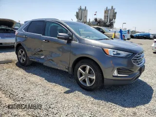 2020 Ford Edge SEL с VIN 2FMPK3J97LBA48892, выставлен на аукционе Copart как лот 58008145 с пробегом 52 588 миль миль и Списание • Salvage title. История ставок и продаж доступна на DreamBid. Изображение 4.