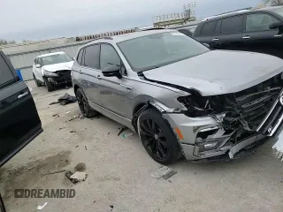 2021 Volkswagen Tiguan SE z VIN 3VV3B7AX5MM119551, wystawiony jako Copart lot #52694855 z przebiegiem 59 922 mil mil oraz Szkoda całkowita • Salvage title. Historia ofert i sprzedaży dostępna na DreamBid. Obrazek 11.