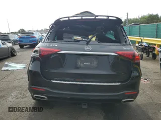 2021 Mercedes-Benz GLE 450 with VIN 4JGFB5KB9MA555105, listed as a Copart auction lot 64255695 with 106,602 mi miles and Salvage title. Bid and sale history available at DreamBid. Image 6.