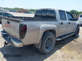2005 GMC Canyon 1SF SLE Z71 z VIN 1GTDT136958143066, wystawiony jako IAAI lot #42191864 z przebiegiem 192 584 mil mil oraz . Historia ofert i sprzedaży dostępna na DreamBid. Obrazek 4.