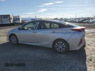 2021 Toyota Prius LE with VIN JTDKAMFP6M3166979, listed as a Copart auction lot 49648705 with 10,689 mi miles and Salvage Title. Bid and sale history available at DreamBid. Image 2.
