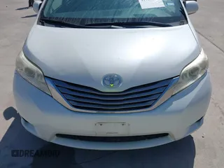 2015 Toyota Sienna XLE with VIN 5TDYK3DCXFS663083, listed as a IAAI auction lot 41967621 with 177,472 mi miles and . Bid and sale history available at DreamBid. Image 12.