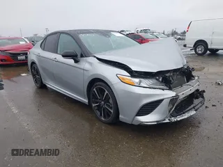 2020 Toyota Camry XSE with VIN 4T1K61AK1LU318098, listed as a IAAI auction lot 41097712 with 64,118 mi miles and . Bid and sale history available at DreamBid. Image 1.