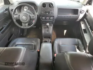2014 Jeep Patriot High Altitude with VIN 1C4NJPFA3ED676843, listed as a Copart auction lot 49769215 with 122,606 mi miles and Salvage Title. Bid and sale history available at carsss.com. Image 8.