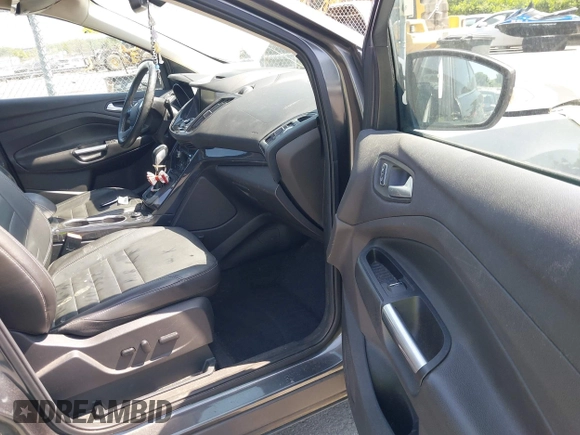 2015 Ford Escape Titanium with VIN 1FMCU0J94FUB24350, listed as a IAAI auction lot 42065641 with 168,215 mi miles. Bid and sale history available at carsss.com. Image 5.