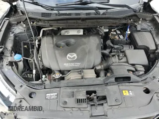 2014 Mazda CX-5 Grand Touring with VIN JM3KE4DY5E0392571, listed as a Copart auction lot 51044335 with 141,334 mi miles and Clean Title. Bid and sale history available at carsss.com. Image 12.