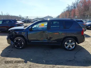 2014 Jeep Compass Limited with VIN 1C4NJDCB5ED700913, listed as a IAAI auction lot 41821956 with 175,312 mi miles. Bid and sale history available at carsss.com. Image 14.