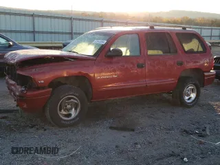 1999 Dodge Durango with VIN 1B4HS28Y8XF546584, listed as a Copart auction lot 82643264 with 194,142 mi miles and Salvage title. Bid and sale history available at DreamBid. Image 1.
