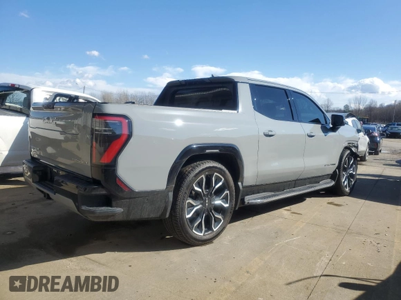 2024 GMC Sierra 1500 with VIN 1GT401EL5RU401222, listed as a Copart auction lot 43251615 with 8,806 mi miles and Salvage Title. Bid and sale history available at DreamBid. Image 3.