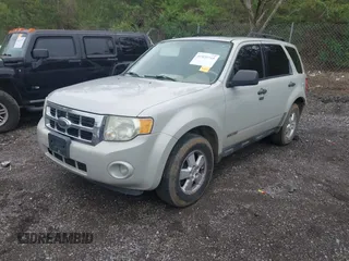 2008 Ford Escape XLT with VIN 1FMCU93148KC00109, listed as a IAAI auction lot 41859745 with 202,312 mi miles. Bid and sale history available at carsss.com. Image 2.