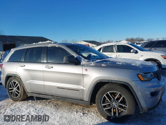 2017 Jeep Grand Cherokee Trailhawk with VIN 1C4RJFLT4HC657682, listed as a IAAI auction lot 41286507 with 123,646 mi miles and . Bid and sale history available at DreamBid. Image 13.