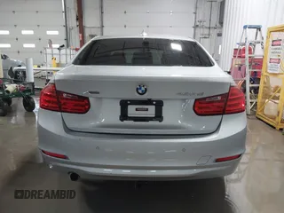 2014 BMW 3 Series 328d xDrive with VIN WBA3D5C55EF147308, listed as a IAAI auction lot 41499435 with 104,941 mi miles. Bid and sale history available at carsss.com. Image 17.