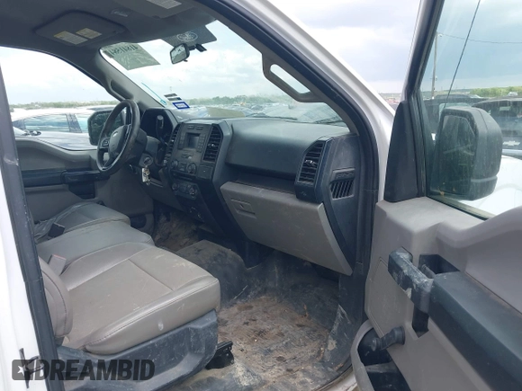 2015 Ford F-150 XL with VIN 1FTMF1E84FKD12758, listed as a IAAI auction lot 41841584 with 59,950 mi miles and . Bid and sale history available at DreamBid. Image 5.