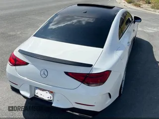 2019 Mercedes-Benz CLS with VIN WDD2J5JB0KA015104, listed as a IAAI auction lot 42108693 with 59,102 mi miles. Bid and sale history available at carsss.com. Image 6.