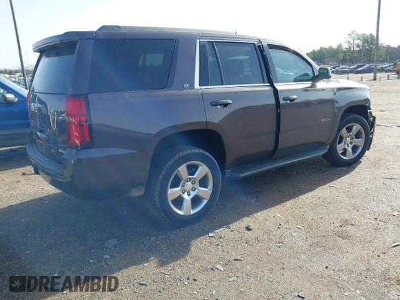 2016 Chevrolet Tahoe LT z VIN 1GNSCBKC3GR238392, wystawiony jako IAAI lot #41443009 z przebiegiem 95 163 mil mil oraz . Historia ofert i sprzedaży dostępna na DreamBid. Obrazek 4.