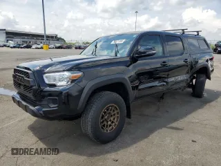 2023 Toyota Tacoma SR with VIN 3TMCZ5AN6PM614407, listed as a Copart auction lot 55531385 with 35,759 mi miles and Salvage title. Bid and sale history available at DreamBid. Image 1.