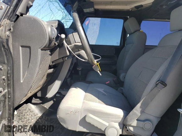 2008 Jeep Wrangler Rubicon with VIN 1J4GA64178L632855, listed as a Copart auction lot 49717905 with 92,031 mi miles and Salvage title. Bid and sale history available at DreamBid. Image 7.