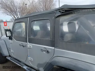 2010 Jeep Wrangler Unlimited Sport with VIN 1J4BA3H10AL112599, listed as a IAAI auction lot 41739263 with 156,301 mi miles. Bid and sale history available at carsss.com. Image 14.