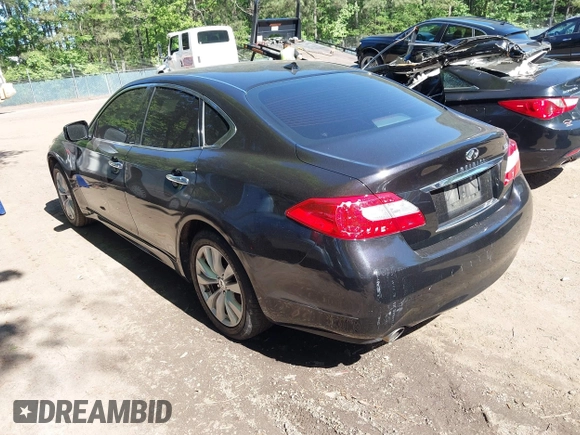 2011 Infiniti M with VIN JN1BY1APXBM324672, listed as a IAAI auction lot 42214163 with 187,424 mi miles. Bid and sale history available at carsss.com. Image 3.