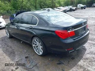 2011 BMW 7 Series 740Li with VIN WBAKB4C5XBC392890, listed as a IAAI auction lot 42108817 with 162,874 mi miles. Bid and sale history available at carsss.com. Image 3.
