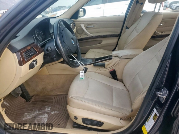 2010 BMW 3 Series 328i xDrive with VIN WBAPK5C57AA652894, listed as a Copart auction lot 62106955 with 114,310 mi miles and Salvage title. Bid and sale history available at DreamBid. Image 7.
