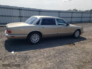 1999 Jaguar XJ with VIN SAJKD6042XC876937, listed as a Copart auction lot 66366064 with 121,747 mi miles and Clean Title. Bid and sale history available at carsss.com. Image 3.