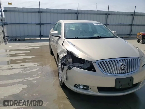 2012 Buick LaCrosse Leather z VIN 1G4GC5E30CF138060, wystawiony jako Copart lot #51160135 z przebiegiem 118 056 mil mil oraz Szkoda całkowita • Salvage title. Historia ofert i sprzedaży dostępna na DreamBid. Obrazek 13.
